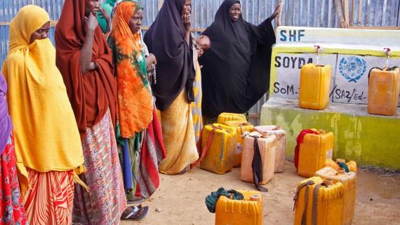 Somali women fetch water at a water project implemented by the Somalia Young Doctors Association (SOYDA) and funded by Somalia Humanitarian Fund (SHF).